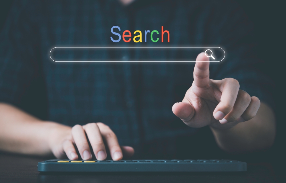 one,hand,touching,with,search,icon,and,another,hand,pressing